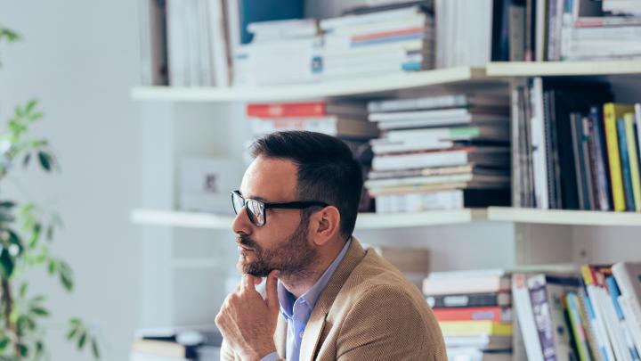 corporate office employee discussing topic