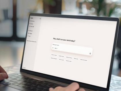 Person using a laptop displaying the Microsoft Copilot interface