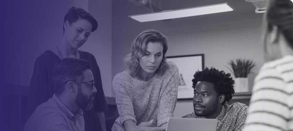 Team of people at a laptop