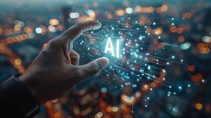 hand reaching out to touch an ai symbol glowing with light